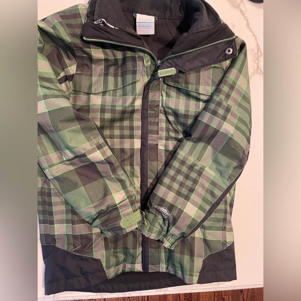 Pre-owned kids medium Columbia coat with built in fleece.
